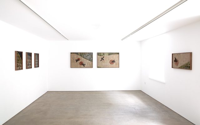 Bryony Rose's ceramic reliefs are hung in Cample Line's downstairs gallery, as part of the exhibition, 'Love Bites'.