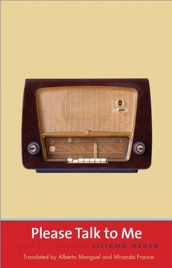 The book cover for ‘Please Talk to Me: Selected Stories’ by Liliana Heker, translated by Alberto Manguel and Miranda France. The cover has a beige background with a photograph of an old-fashioned radio in the centre. The title, author’s name and translators’ names are displayed at the bottom against a red rectangle background.