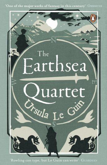 The book cover for ‘The Earthsea Quartet’ by Ursula Le Guin. The cover is a pale bluey-green, and the title and author’s name are displayed in the centre inside of a circle. The symbol of a dagger underlines some of the text. Above the circle is the silhouette of a person looking out onto a mountainous night-time landscape. Below the circle is the silhouette of a person with mirrored dragon-like creatures facing them from either side.
